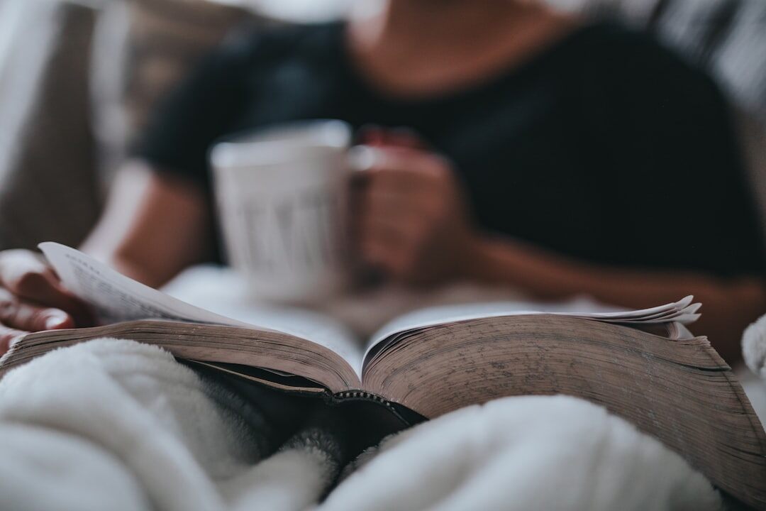 person reading old book